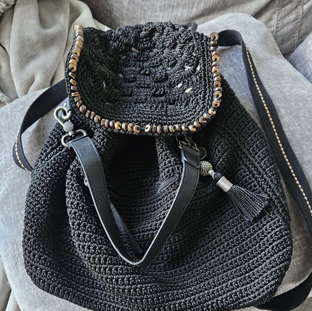 The Sak Black Crochet Backpack with Beaded Trim and Tassel